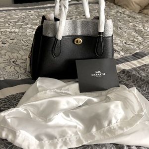 Black leather Coach bag.